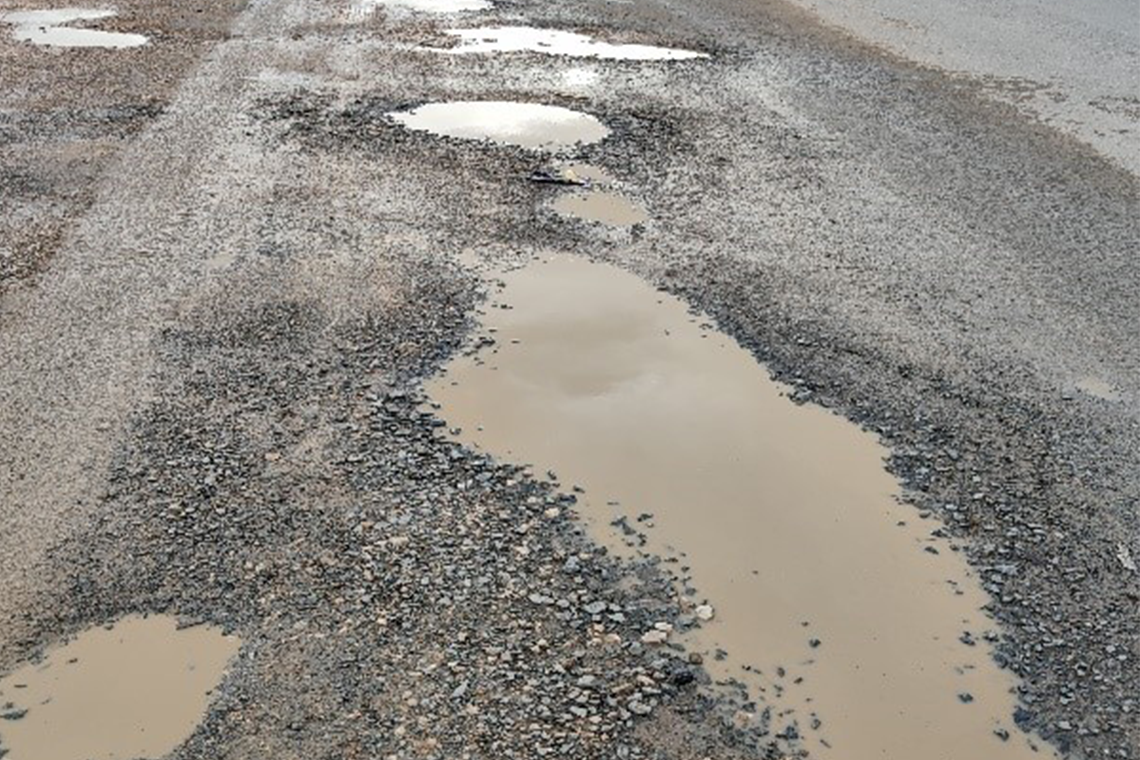 The Case of Flooded Asphalt Roads under construction 